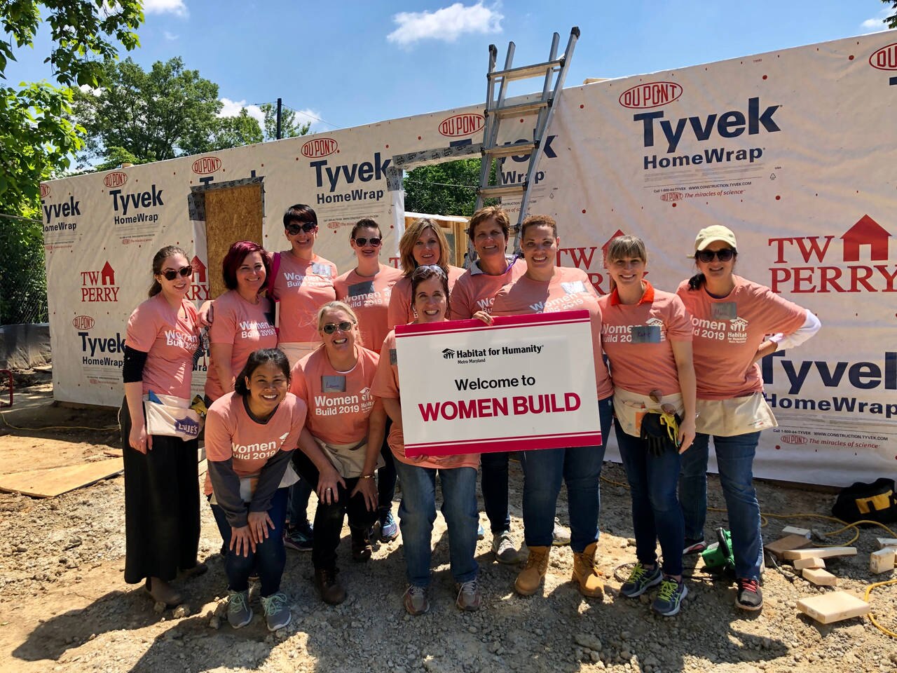 group of women on a construction site for habitat for humanity